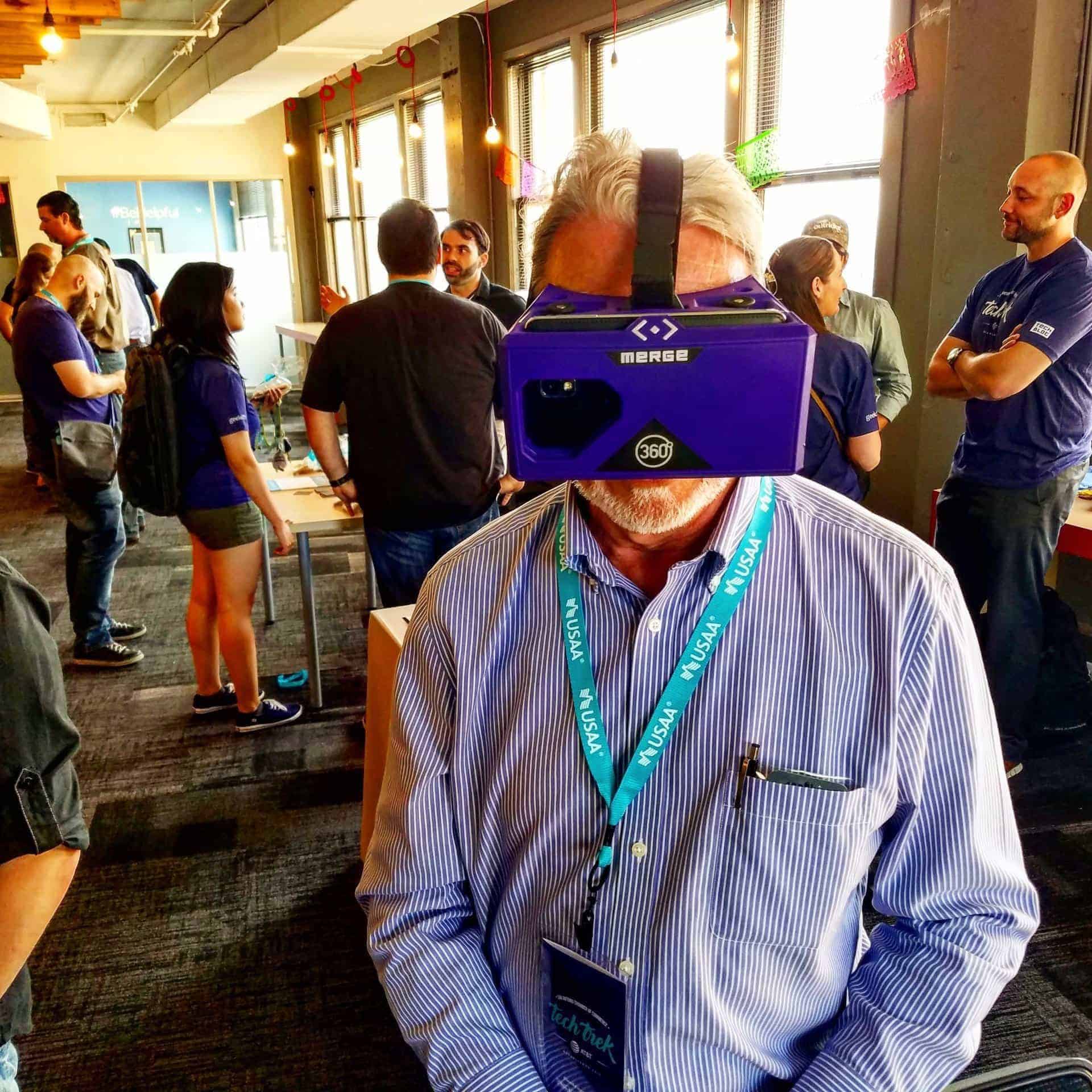 A man looking at Braustin homes using VR googles