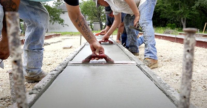 Concrete runner foundation being leveled for a Braustin customer
