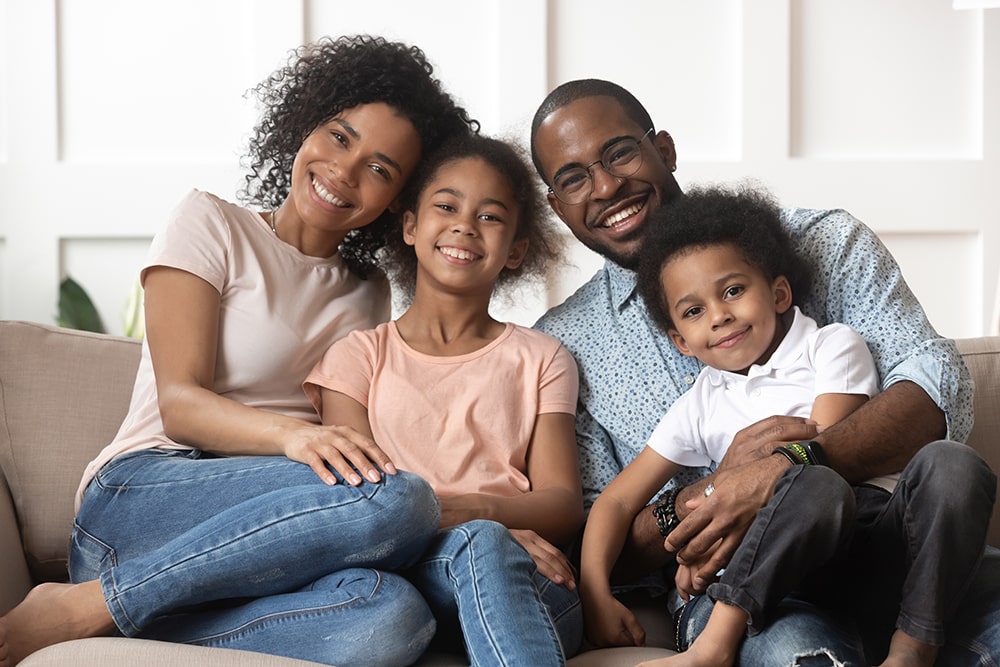 Happy family in a comfortable mobile home