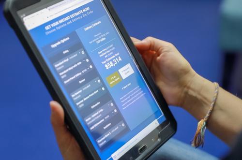 Getting an instant mobile home price estimate on the Braustin Homes website using an iPad view 1