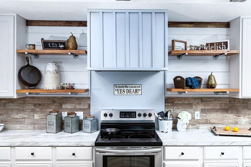 shelving added to kitchen to maximize storage in mobile home